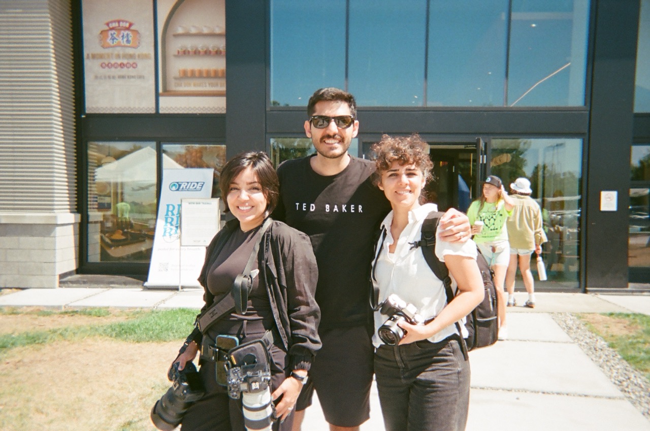 Three of the crew on 35mm outside an event venue